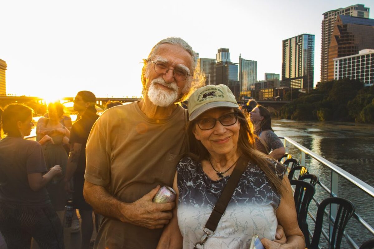 Dianne and Lee at ABR boat party with Austin skyline